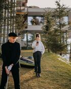People golfing